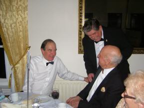 Richard Western & Charklie Headon ( seated) share a joke with John Mutum ( Zone Chairman)